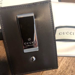 GG Supreme canvas money clip w/ leather details.